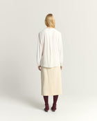 BLUSA FLUIDA CON SCOLLO A V