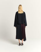 PLEATED MIDI SKIRT WITH PANELS