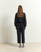 TROUSERS WITH ELASTIC WAISTBAND AND METAL DETAILS